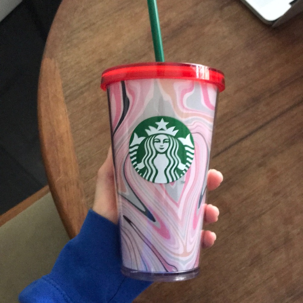 Pink Starbucks plastic reusable water bottle.